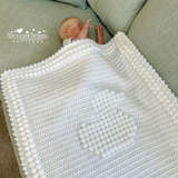 White Duck blanket on baby