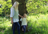 Mother and child wearing tabards